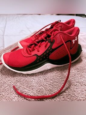 Red and Black Under Armour shoes. Youth 5.5.